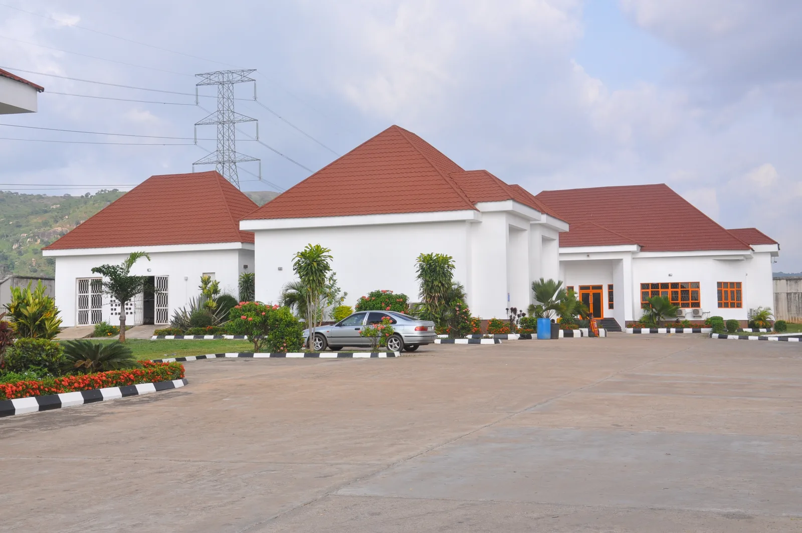 Dan Oil Katampe station support building with the surrounding hillside